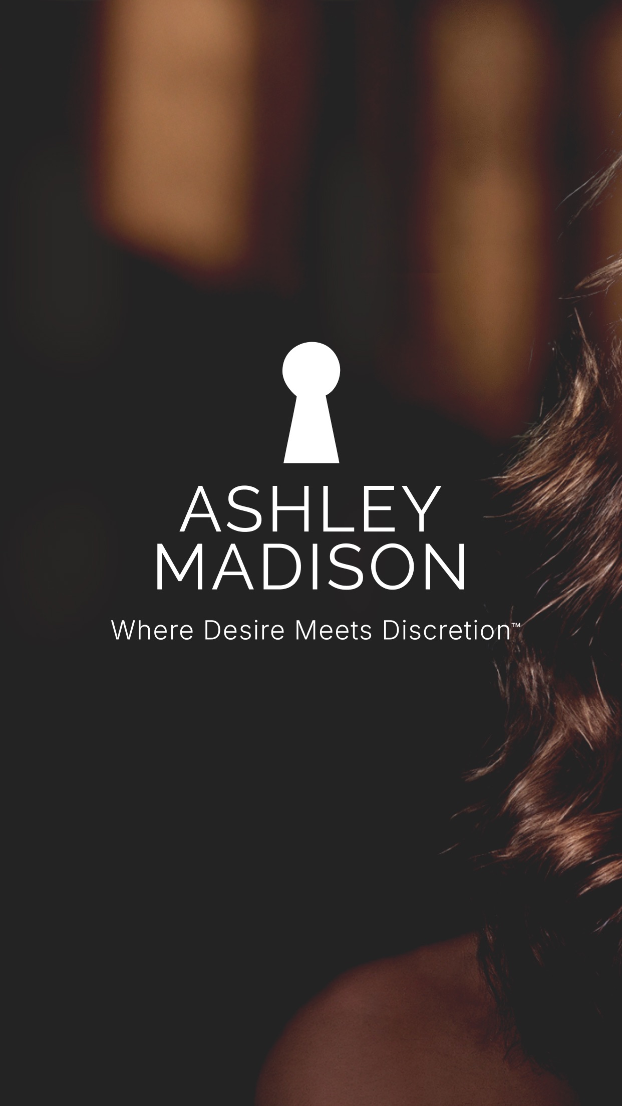 Splash screen with the keyhole mark and the line Where Desire Meets Discretion